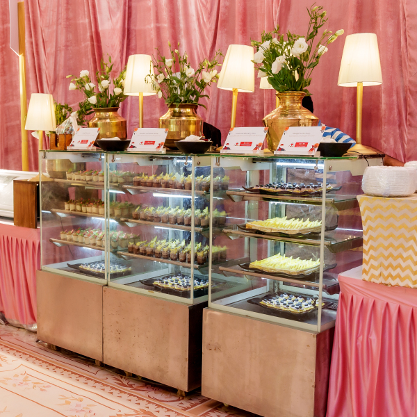 Sar V Sri sweets showcaing in enclosed glass stall